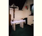 Olt v cele Juliany z Norwiche s oknem vedoucm ven